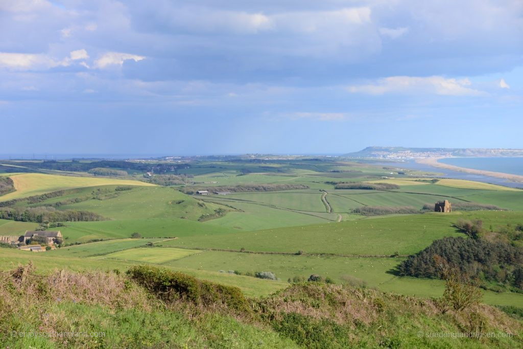 Looking back; Abbotsbury is on the left in the valley, with St. Catherines Chapel on the hill in the middle and Chesil Beach on the Jurassic Coast is on the right