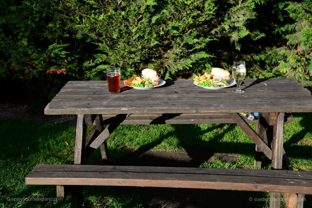 Classic food and drink in the garden: Two Steak and Ale pies, one Ale and one Cider.